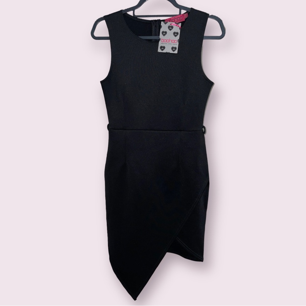 Asymmetric dress. Perfect staple for work. little black dress approved!